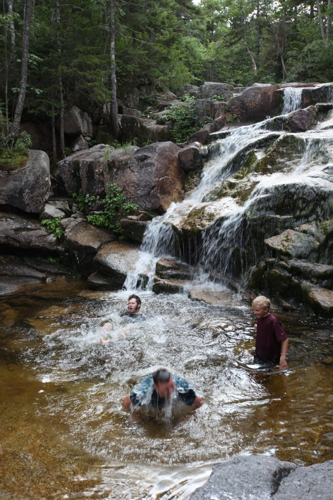 Benj and Maurice taking a dunk while Josh taunts us
