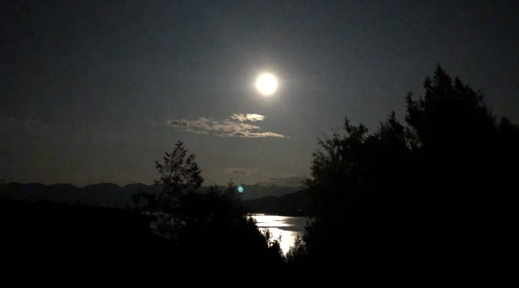 The Moonrise Over Flat Head Lake