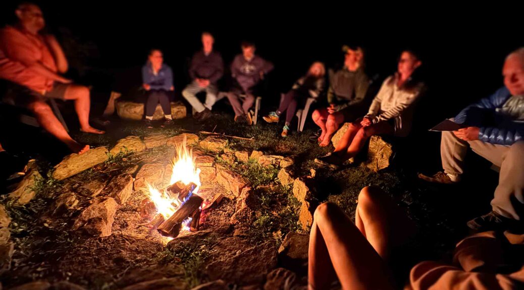 AT thru-hikers around a campfire at Woods Hole Hostel