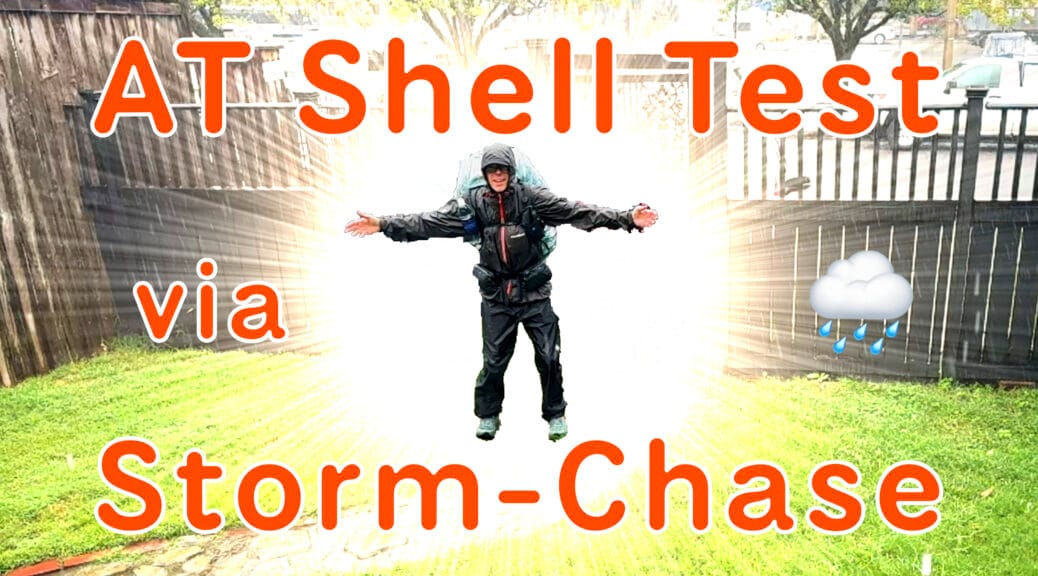 Benj wears his outer shell layers in the rain